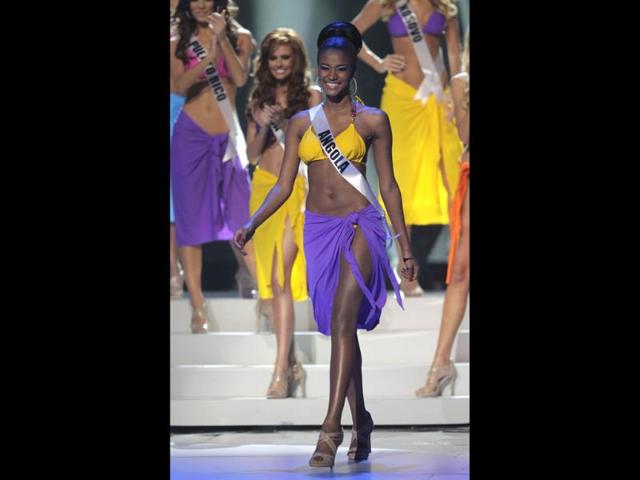 Miss Angola Leila Lopes looks chic in the swimsuit as she steps forward after being named a finalist.