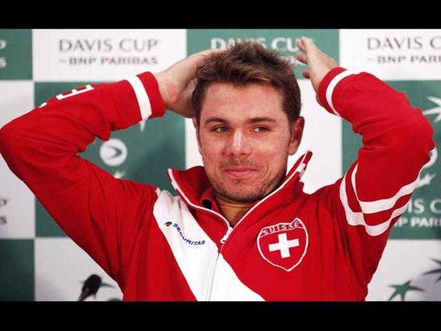Stanislas Wawrinka of Switzerland gestures during the Davis Cup official news conference in Sydney.