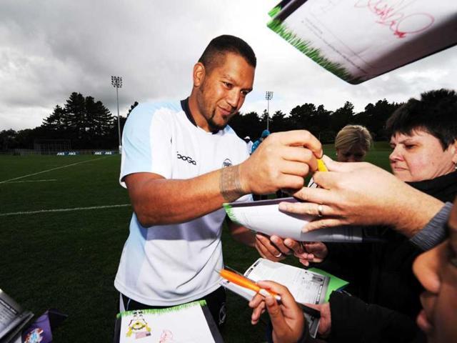 Fiji's Nicky Little signs autographs after a training session in preparation for the 2011 Rugby World Cup, at Porirua Park in Wellington.