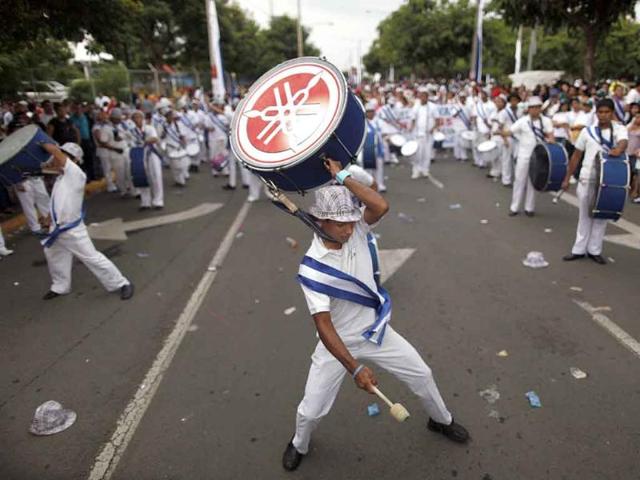 A student performs during an event marking the 190th anniversary of Nicaragua's independence in Managua, Nicaragua.