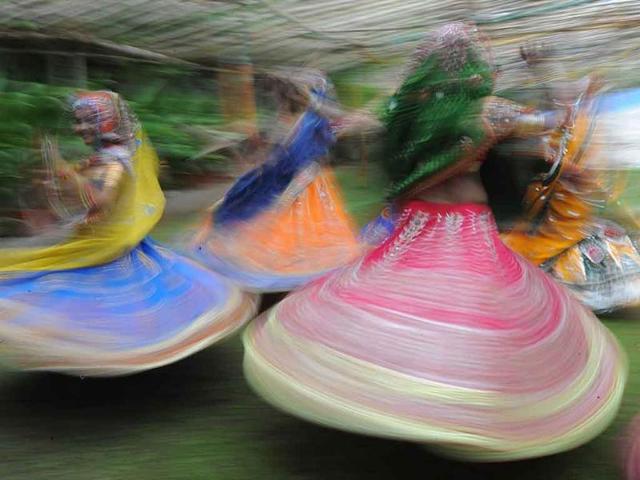 Folk dancers from the Zanzar Performing Arts perform during a full dress rehearsal for the forthcoming Navratri festival.