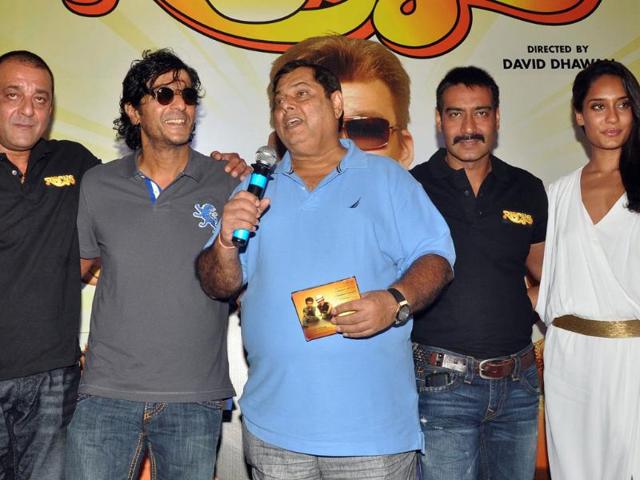 Director David Dhawan (centre) with the cast - (From Left) Sanjay Dutt, Chunky Pandey and Ajay Devgn. (AFP)
