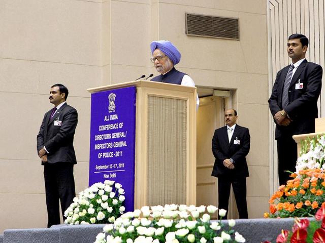 Prime Minister Manmohan Singh sorrounded by SPG personnels during the DGPs/IGPs conference at Vigyan Bhavan in New Delhi.