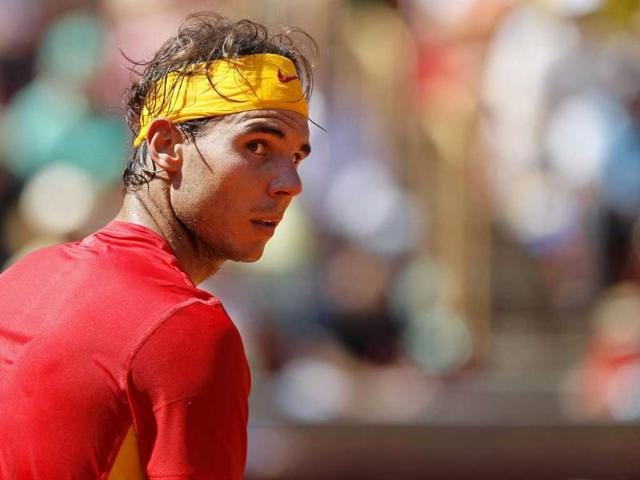 Rafael Nadal reacts during the first match of the Davis Cup semifinal at Los Califas bullring in Cordoba, southern Spain.