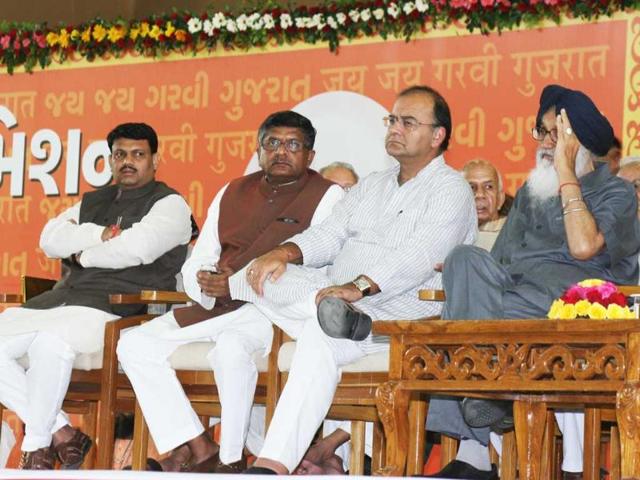 Punjab chief minister Prakash Singh Badal with BJP leaders Arun Jaitley and Ravi Shankar Prasad at the launch of Gujarat chief minister Narendra Modi's three-day fast at Gujarat Convention Centre in Ahmedabad.