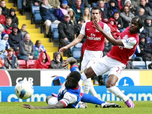 Arsenal-s-Gervinho-right-beats-the-tackle-of-Blackburn-s-Chris-Samba-left-to-score-a-goal-during-their-English-Premier-League-soccer-match-at-Ewood-Park-Blackburn-England