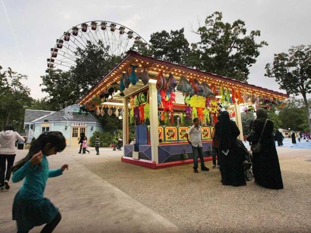 Muslims gather during Great Muslim Adventure Day at Six Flags Great Adventure amusement park in Jackson, New Jersey. Thousands of Muslims converge on the park every year to celebrate the end of Ramadan in what is billed as one of the largest outdoor gatherings of Muslims in the United States.