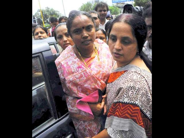 Police detain Jagruti Pandya, wife of former minister Haren Pandya, on her way to meet Gujarat chief minister Narendra Modi for demand for re investigation of murder of her husband, in Ahmedabad.