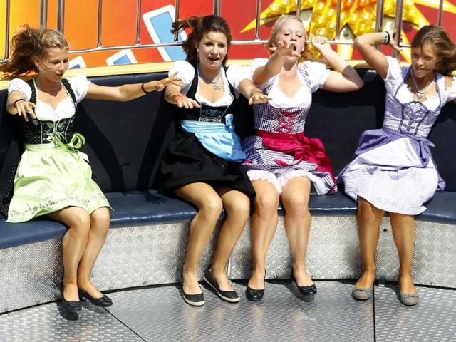 Visitors ride a carousel during the first day of the Munich Oktoberfest.
