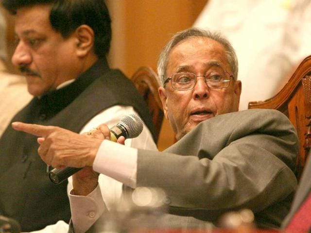 Finance minister Pranab Mukherjee addressing the media at a press conference in Mumbai.