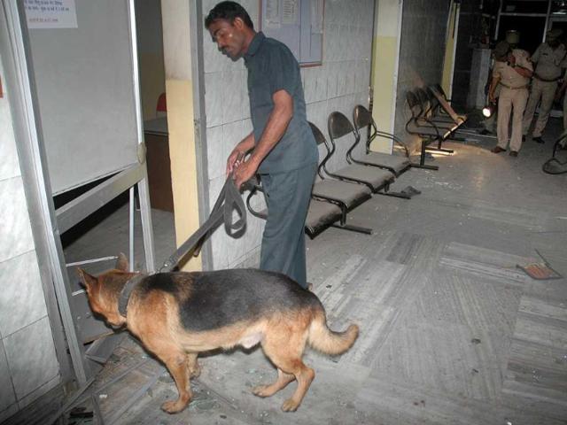 Police personnel investigate the site of explosion at Jai Hospital in Agra.