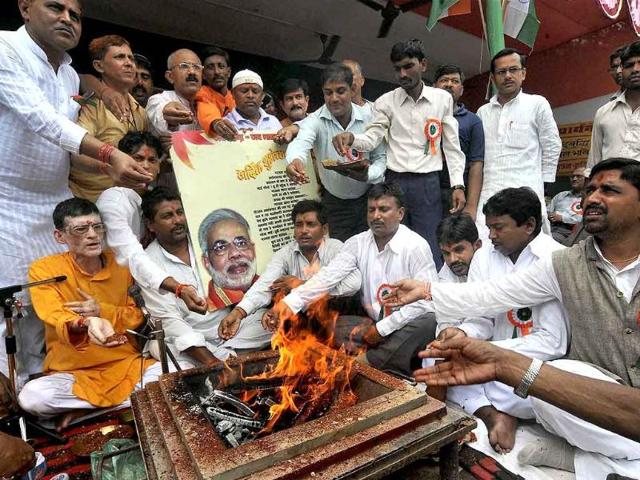 BJP activists perform a 'havan' in support of Gujarat chief minister Narendra Modi, in Patna.