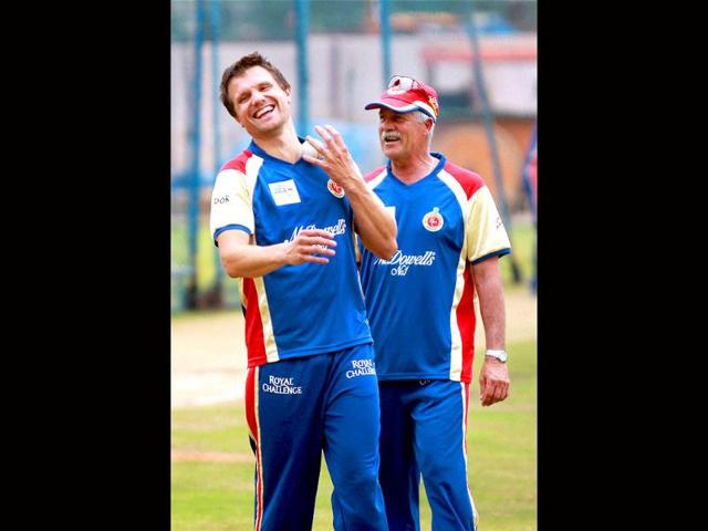Royal Challengers Bangalore player Dirk Nannes with coach Ray Jenning during a practice session for Champions league 2011 at National Cricket Academy ground in Bangalore.