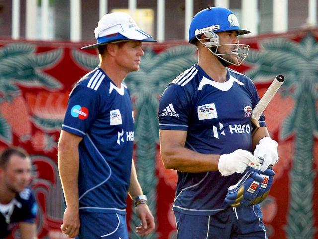 Mumbai Indians coach Shaun Pollock and player Andrew Symonds during a practice session for Champions League 2011 at MAC Stadium in Chennai.