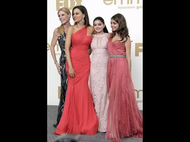Modern Family cast members from left, Julie Bowen, Sofia Vegara, Ariel Winter and Sarah Hyland pose backstage at Emmy Awards. (AP)