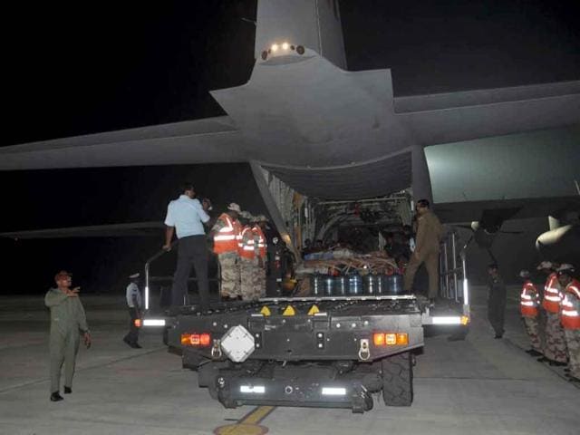 Rescue equipments and material being loaded on an aircraft for the North-East quake victims.