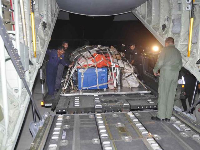 Rescue equipments and materials being loaded on a aircraft for the North-East quake victims.
