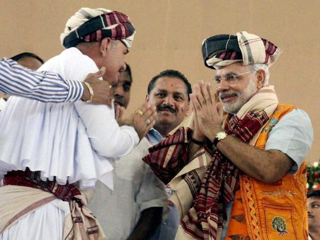 Gujarat chief minister Narendra Modi is honoured by the shepherd community during the third day of his fast in Ahmedabad.
