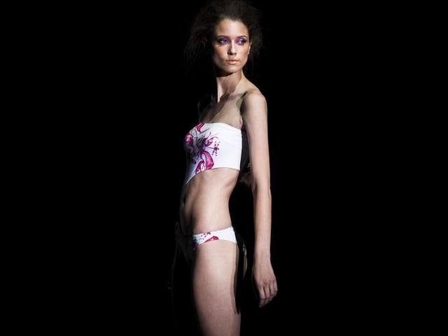 A floral look accentuated by the brightly-coloured eye-makeup.