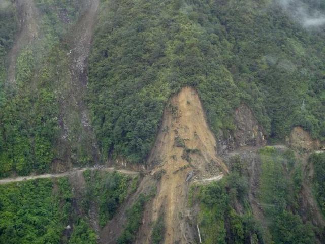 An aerial view of a landslide on a road on the outskirts of Gangtok, after an earthquake struck the north-eastern Indian state of Sikkim. Nestling in the Himalayas between Nepal, Tibet and Bhutan, Sikkim is a region of mountain myths, Buddhist monasteries and scattered communities far outside the mainstream.