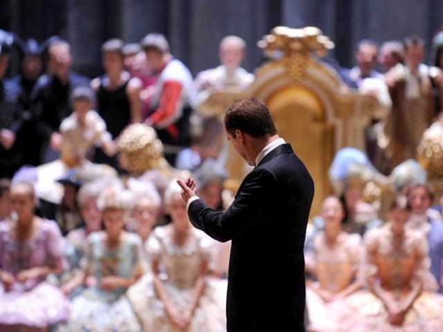 Russia's President Dmitry Medvedev (S) speaks with members of the Bolshoi Theatre company in Moscow.