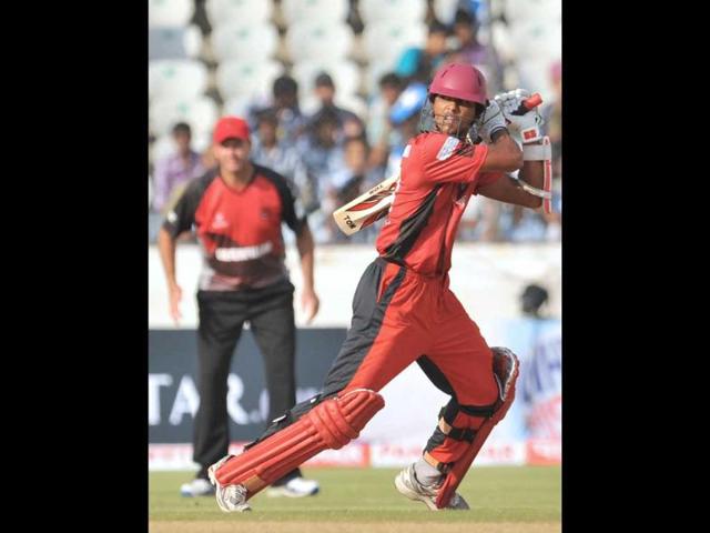 Ruhunu XI batsman Dinesh Chandimal plays a shot during the Champions LeagueTwenty20 League qualifying pool cricket match between Ruhunu XI and Leicestershire Foxes at The Rajiv Gandhi International Stadium in Hyderabad.