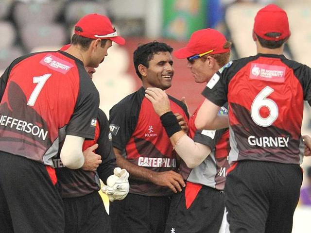Leicestershire Foxes bowler Abdul Razzaq (C) celebrates with teammates after taking the wicket of unseen Ruhunu batsman Janaka Gunaratne during the Champions LeagueTwenty20 League qualifying pool cricket match between Ruhunu XI and Leicestershire Foxes at The Rajiv Gandhi International Stadium in Hyderabad.