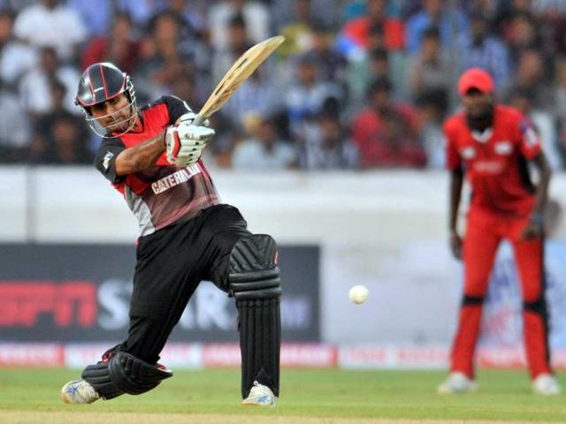 Leicestershire Foxes batsman Abdul Razzaq play a shot for the boundary and scores his half century (50 runs) during the Champions LeagueTwenty20 League qualifying pool cricket match between Ruhunu XI and Leicestershire Foxes at the Rajiv Gandhi International Stadium in Hyderabad.