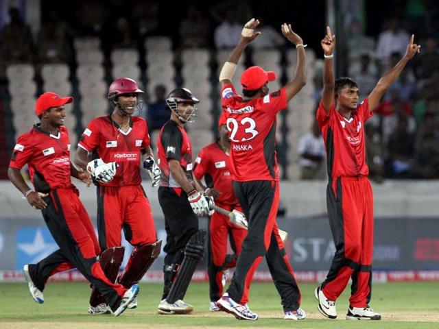 Ruhunu Eleven bowler Alankara celebrates with teammates the wicket of Leicestershire Foxes batsman Jefferson during the Champions League T20 match between Leicestershire Foxes and Ruhunu Eleven at Rajiv Gandhi International Cricket stadium at Hyderabad.