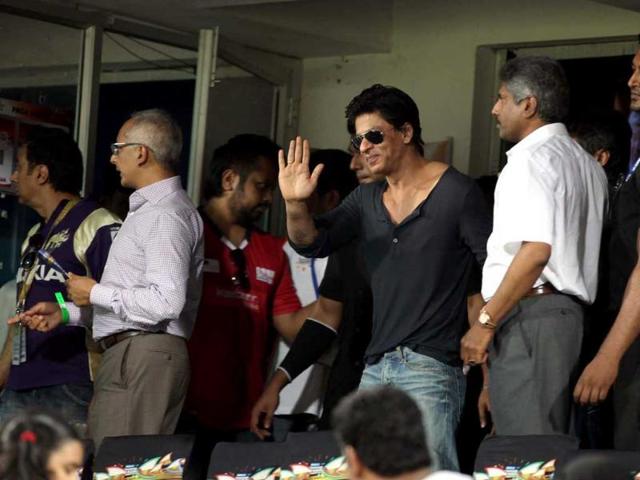 KKR owner Shahrukh Khan greets players on his arrival at the stadium during the Champions League T20 match between Kolkata Knight Riders and Somerset at Rajiv Gandhi International Cricket stadium at Hyderabad.