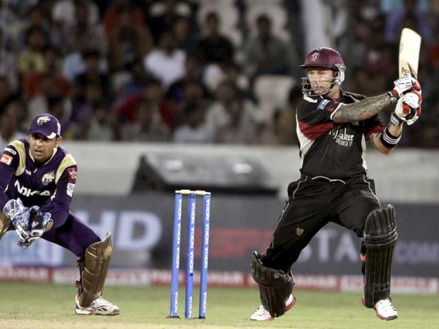 Somerset batsman Peter Trego plays a shot as Kolkata Knight Riders wicketkeeper Manvinder Bisla looks on during the Champions League Twenty20 qualifying cricket match between Kolkata Knight Riders and Somerset in Hyderabad.