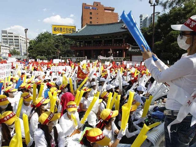 Prostitutes attend a protest against the government's crackdown on brothels in Seoul.