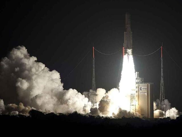 An Ariane-5 rocket blasts off from the European space centre at Kourou, French Guiana.