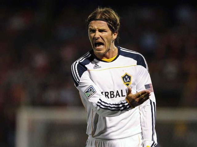 Los Angeles Galaxy's David Beckham argues with the referee during their CONCACAF Champions League soccer match against Costa Rica's Alajuelense in Alajuela.