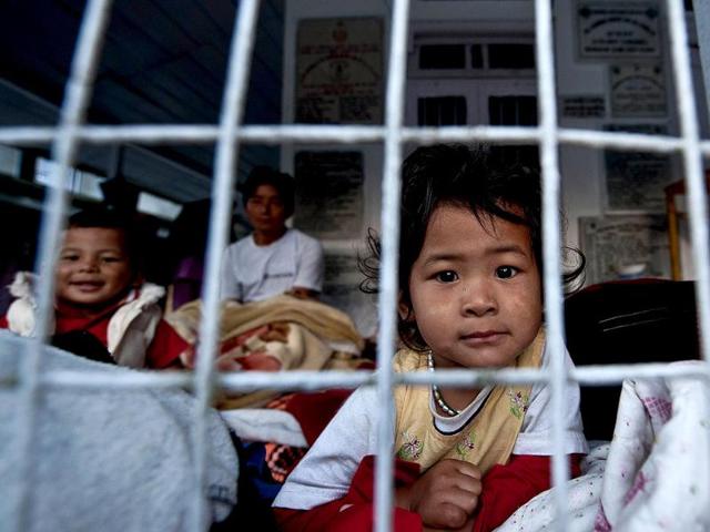 Earthquake displaced children rest at relief shelter inside a Gurdwara in Chungthang, after a 6.9-magnitude earthquake hit the region on September 18.