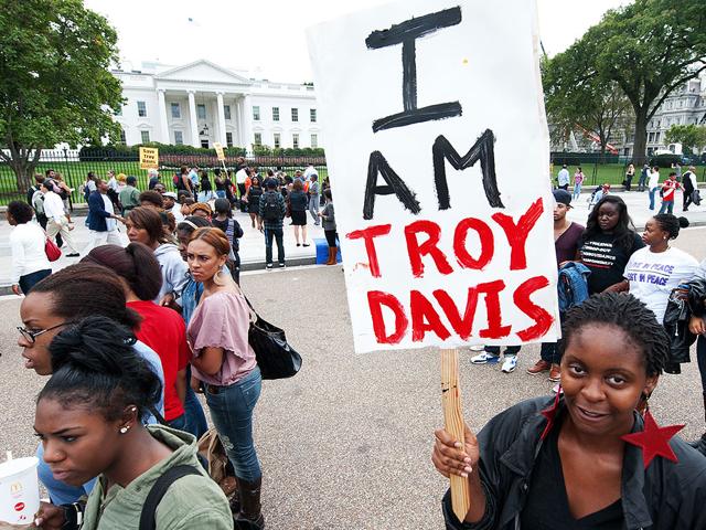 File photo of student protestors from Howard University as they demonstrate outside the White House, demaning a last-minute intervention on behalf of Troy Davis.