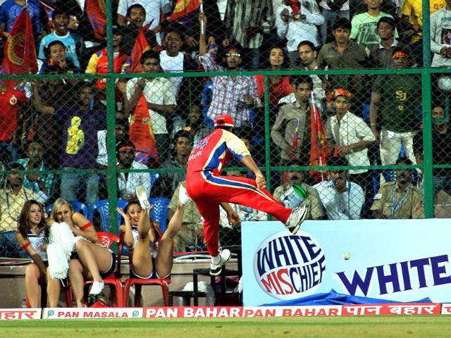 RCB fielder Mayank Agarwal jumps in an attempt to stop a sixer during the Champions League Twenty20 League group B match between Royal Challengers Bangalore and Warriors at the M Chinnaswamy Stadium in Bangalore.