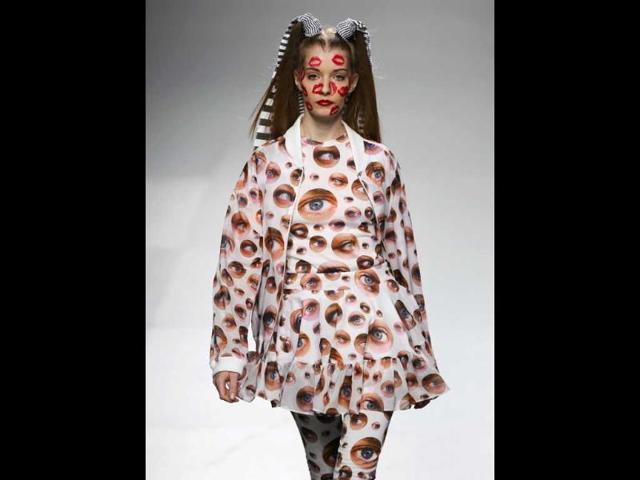 Eye full! A model showcases a printed design at the Madrid fashion week.