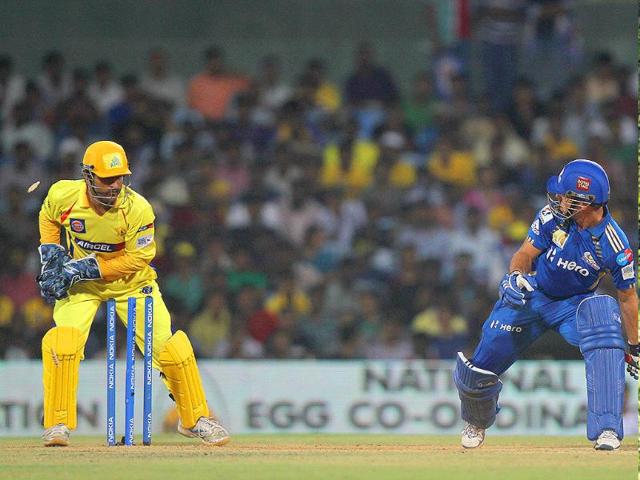 Chennai Super Kings MS Dhoni taking the bails off to stumpout DJ Jacobs during CL T20 match at Chidambaram Stadium in Chennai.