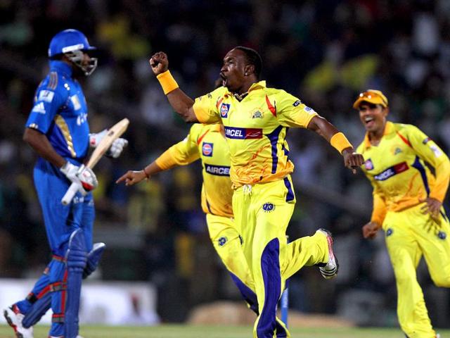 CSK's Dwayne Bravo celebrate after taking the wicket of Andrew Symonds during CL T20 match at Chidambaram Stadium in Chennai.