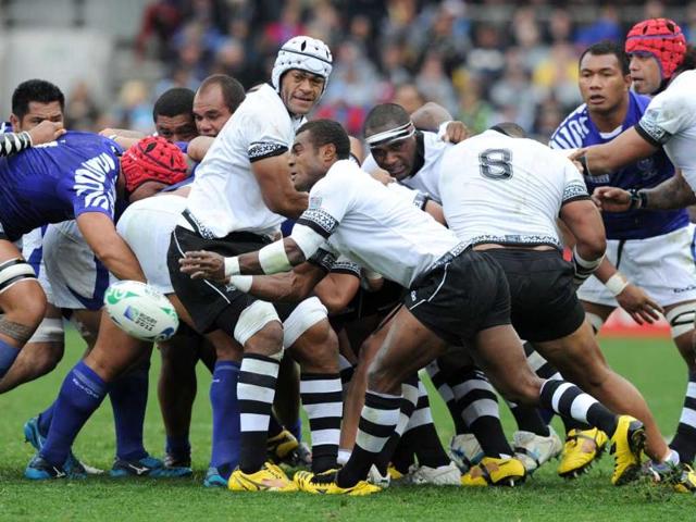 Fiji's scrum-half Nemia Kenatale passes the ball during the 2011 Rugby World Cup pool D match Fiji vs Samoa at the Eden Park stadium in Auckland.