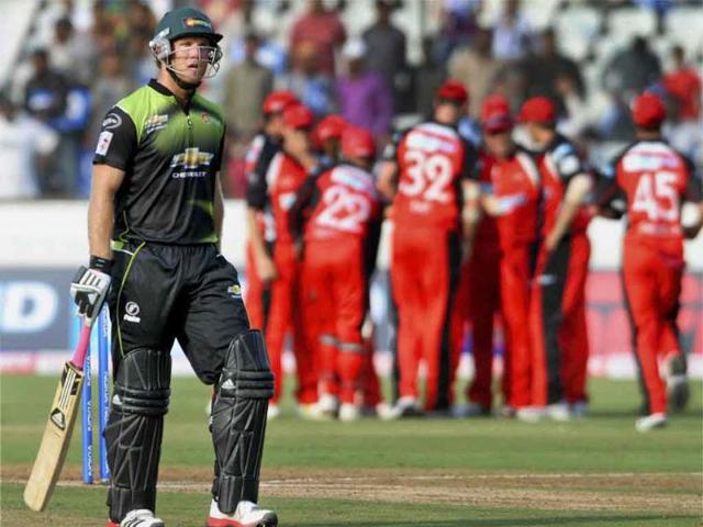 South Australia players celebrate the wicket Colin Ingram during their Champions League Twenty20 match in Hyderabad.