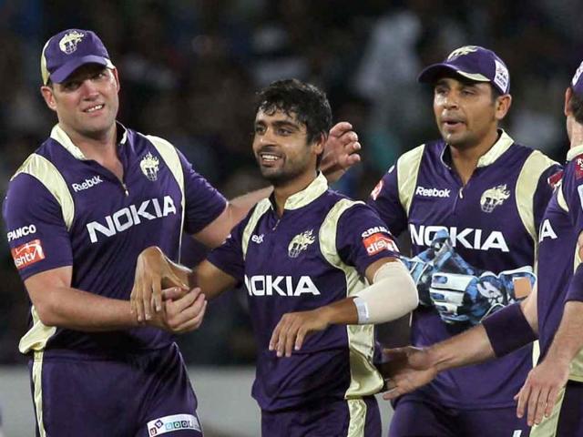 KKR bowler Iqbal Abdulla celebrates, with teammates, the wicket of Somerset batsman Jones, during the Champions League match between Kolkata Knight Riders and Somerset.