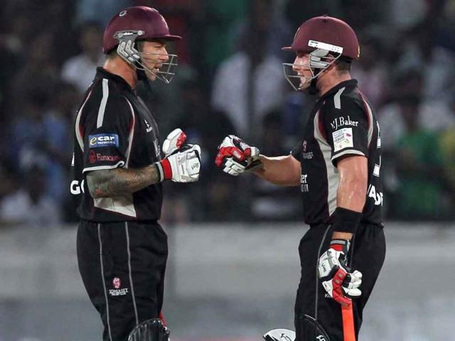 Somerset batsmen Trego and Van der Merwe play during the Champions League match between Kolkata Knight Riders and Somerset.