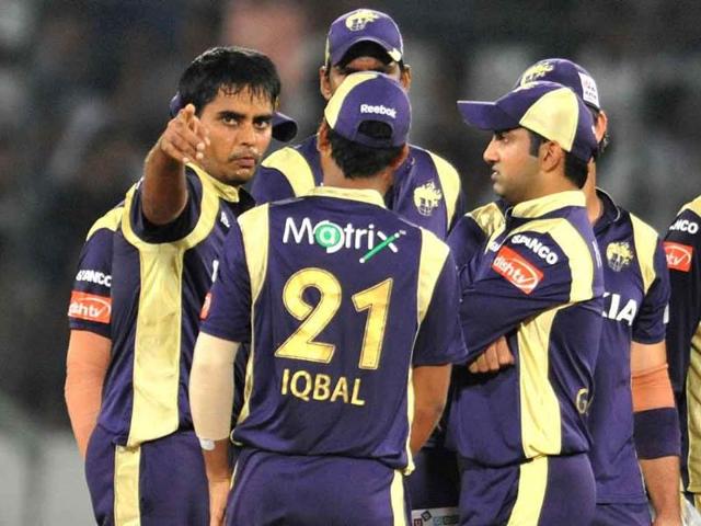 Kolkata Knight Riders bowler Rajat Bhatia (L) celebrates the wicket of Arul Suppiah of Somerset during the Champions League Twenty20 Group B cricket match at the Rajiv Gandhi International Stadium in Hyderabad.