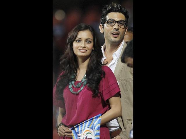 Diya Mirza and Zayed Khan before the match between Trinidad and Tobago and Mumbai Indians at the Chinnaswamy Stadium in Bangalore.