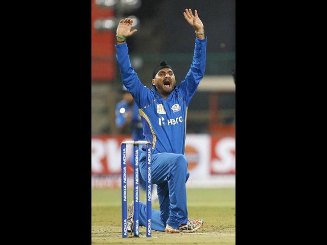 Mumbai Indians captain Harbhajan Singh appeals for the wicket of Trinidad and Tobago batsman Darren Bravo during their Champions League Twenty20 cricket match in Bangalore.