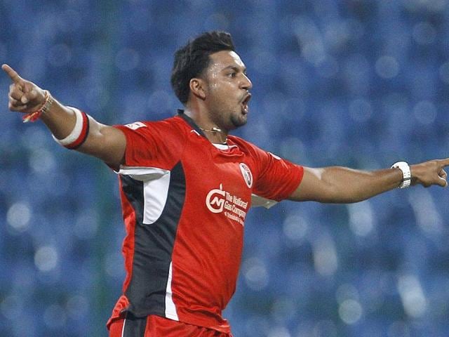 Trinidad and Tobago bowler Ravi Rampaul celebrates the dismissal of Mumbai Indians batsman James Franklin during their Champions League Twenty20 cricket match in Bangalore.