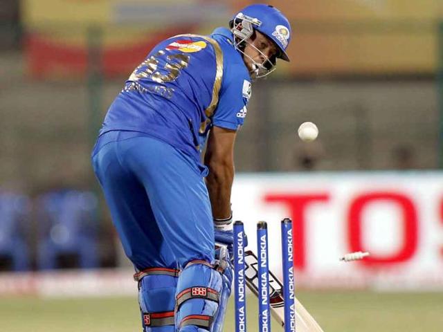 Andrew Symonds of Mumbai Indians gets bowled out during the CLT20 match between Trinidad and Tobago and Mumbai Indians.
