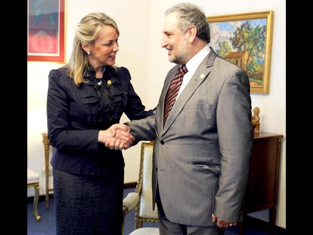 Paraguay's foreign minister Jorge Lara Castro (R) meets Union of South American Nations secretary general Maria Emma Mejia in Asuncion.